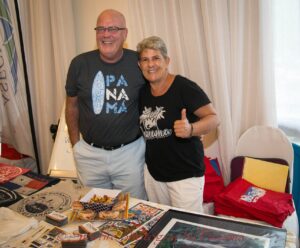 Bill & I selling shirts